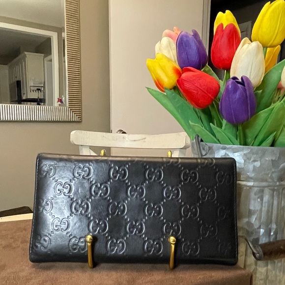 Gucci black leather Guccisimo trifold wallet with blk leather & gold tipped bow - Picture 3 of 15